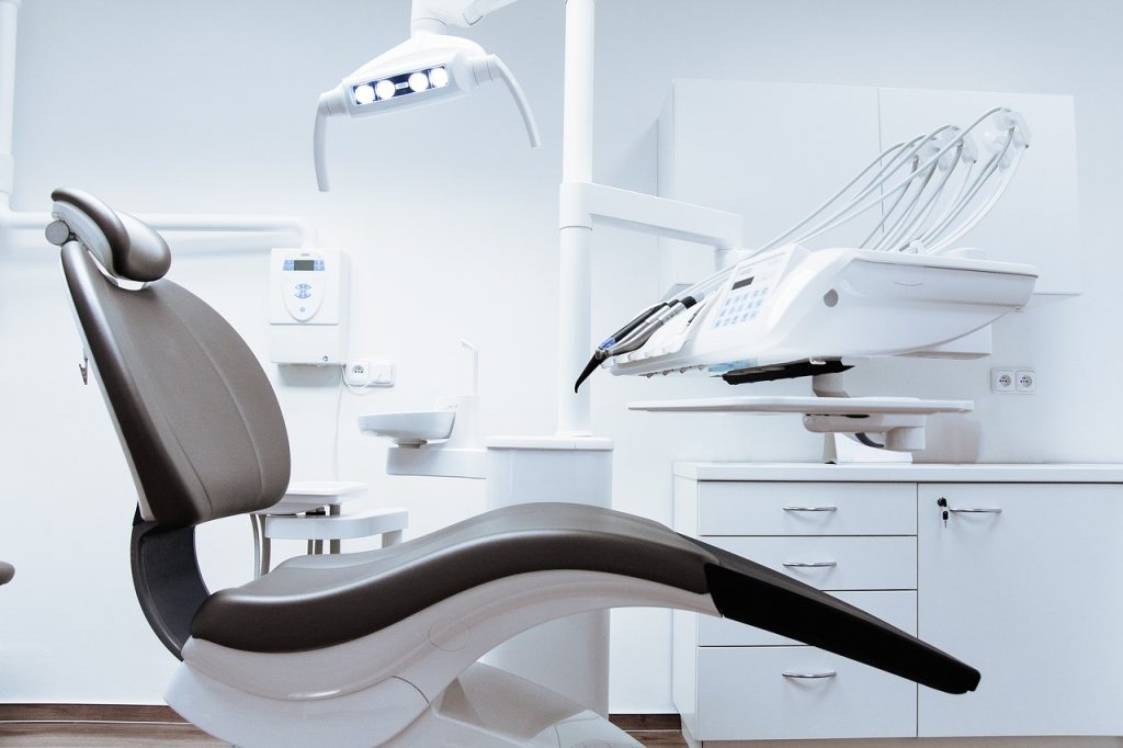Dental treatment chair and dental equipment in a modern clinic, emphasizing dental health services relevant to Utah residents.